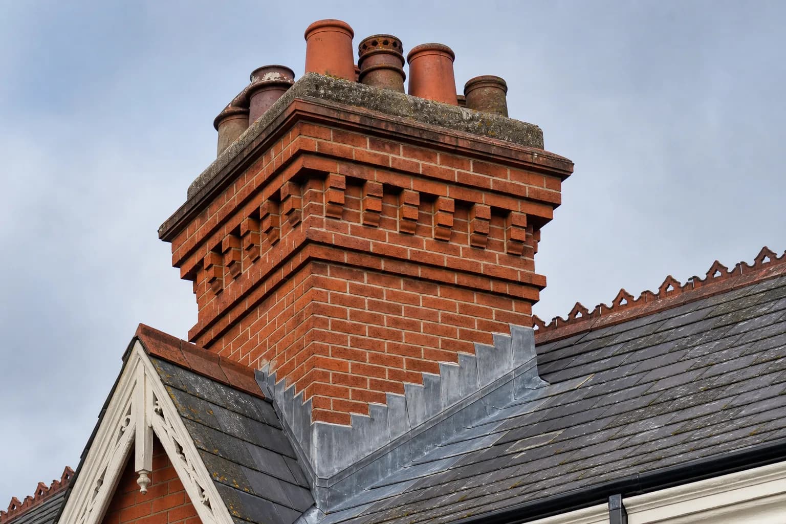 Traditional brick chimney with lead flashing